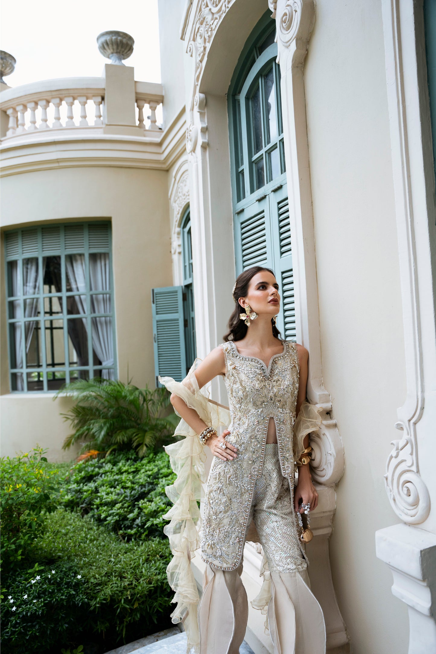 Model wearing Fifi from Mysie by Tahira, a beige embellished outfit with flared pants, perfect for Pakistani luxury pret in the UK.