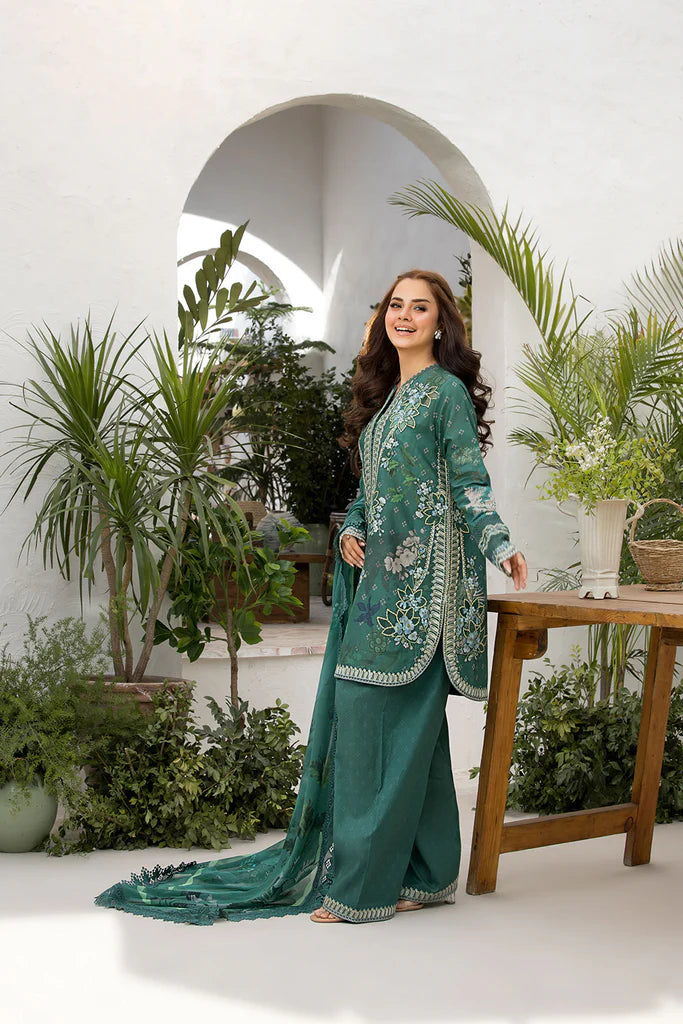 Model wearing Sobia Nazir Vital 2025 Design 9B in emerald green with elegant embroidery and matching dupatta. Shop Pakistani luxury pret and Pakistani clothes online in UK.