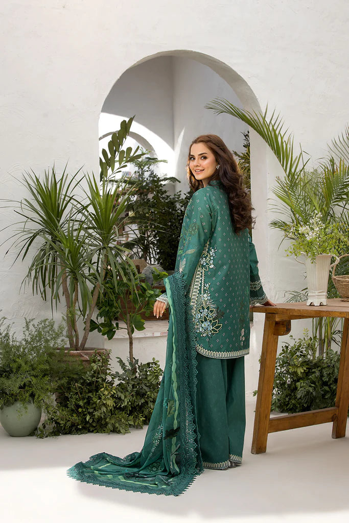Model wearing Sobia Nazir Vital 2025 Design 9B in emerald green with elegant embroidery and matching dupatta. Shop Pakistani luxury pret and Pakistani clothes online in UK.