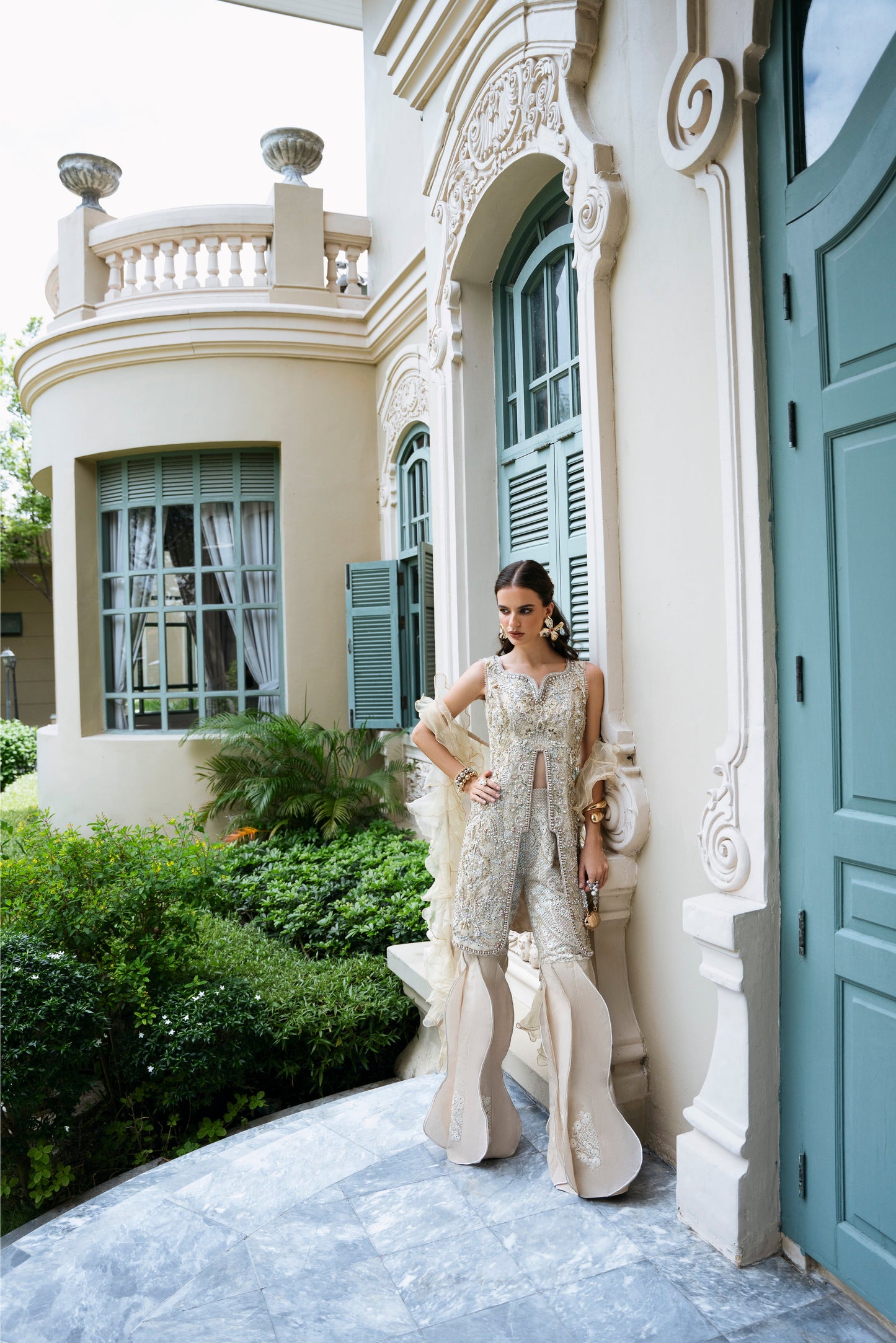 Model wearing Fifi from Mysie by Tahira, a beige embellished outfit with flared pants, perfect for Pakistani luxury pret in the UK.