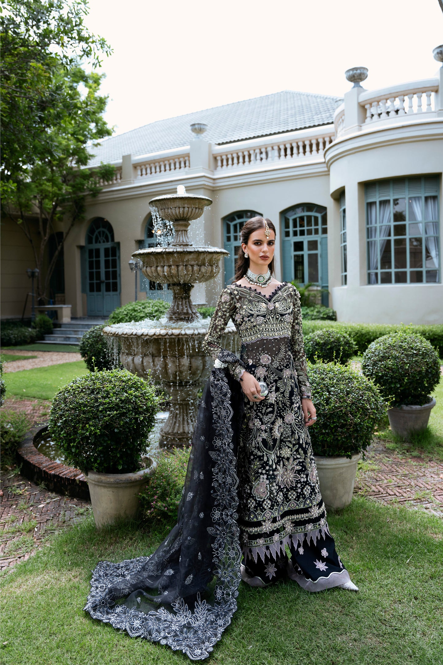 Model wearing Apana from Mysie by Tahira, featuring black luxury pret with intricate embroidery—Pakistani clothes online in UK.