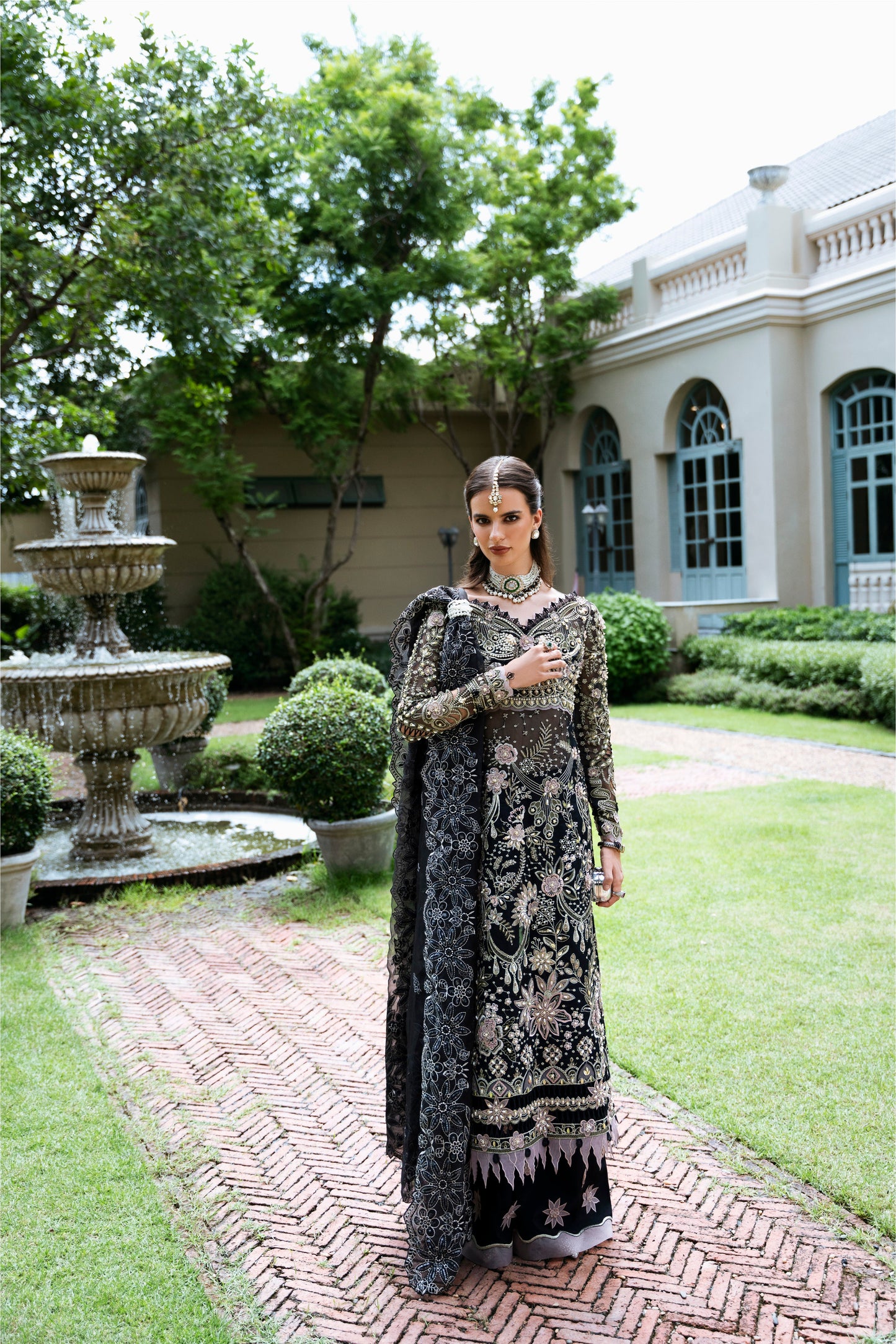 Model wearing Apana from Mysie by Tahira, featuring black luxury pret with intricate embroidery—Pakistani clothes online in UK.
