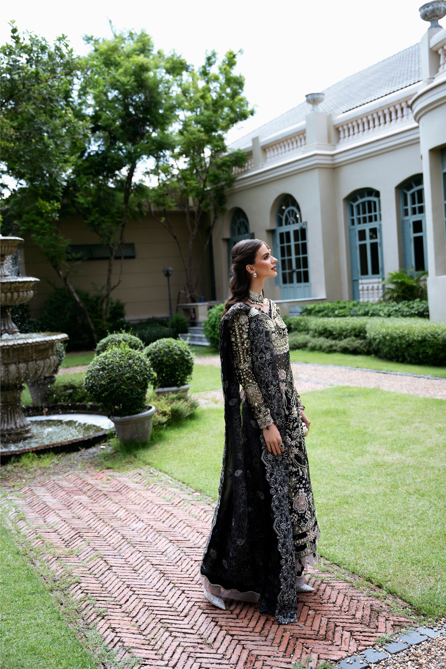 Model wearing Apana from Mysie by Tahira, featuring black luxury pret with intricate embroidery—Pakistani clothes online in UK.