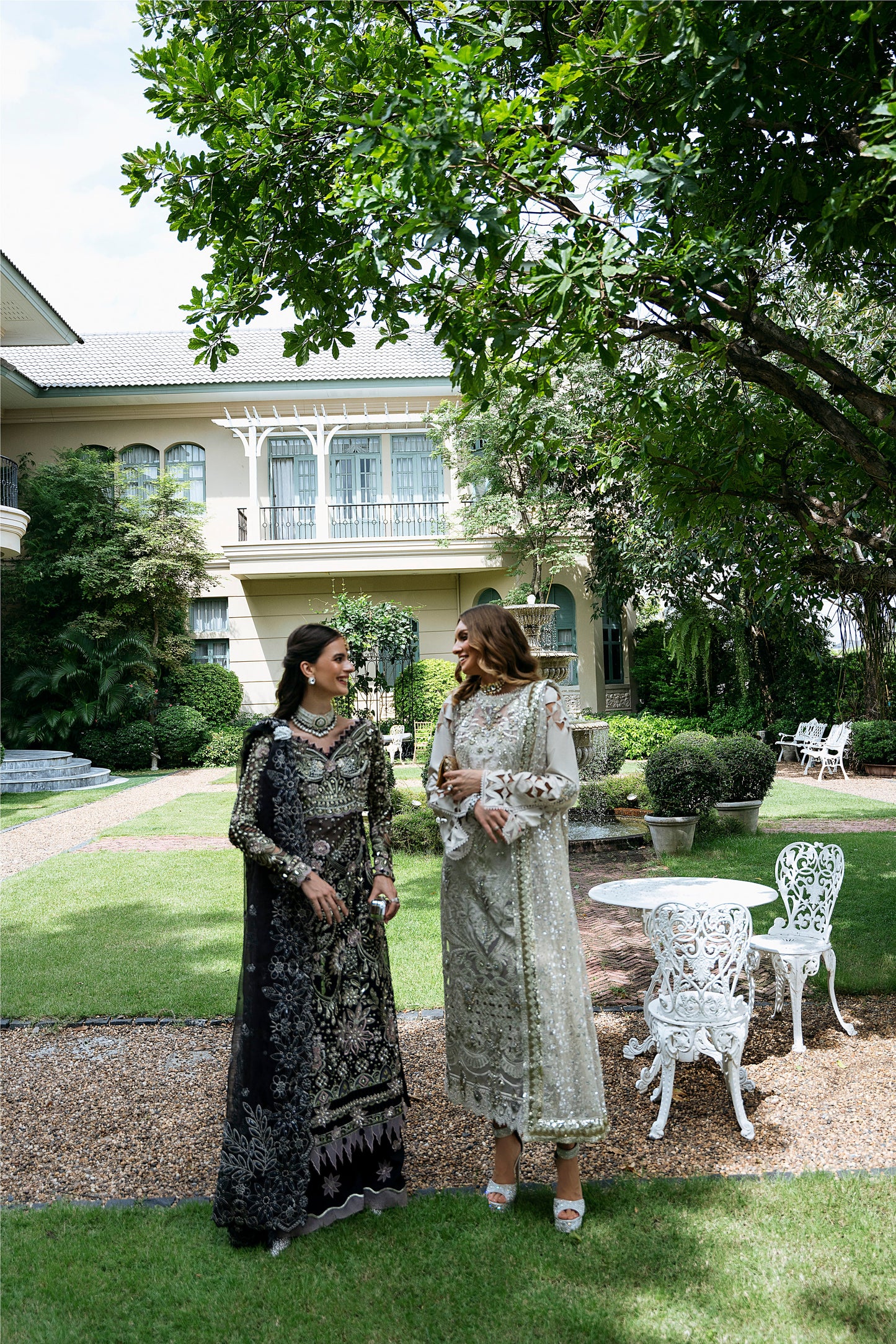 Model wearing Apana from Mysie by Tahira, featuring black luxury pret with intricate embroidery—Pakistani clothes online in UK.
