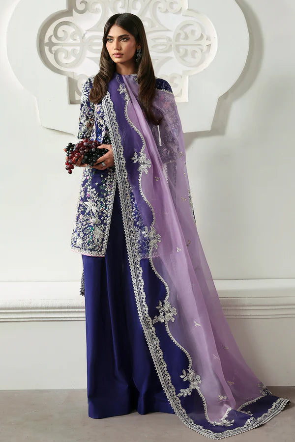 Model wearing Althea by Soraya in deep navy and lavender embroidered outfit – Pakistani luxury pret available online in UK.
