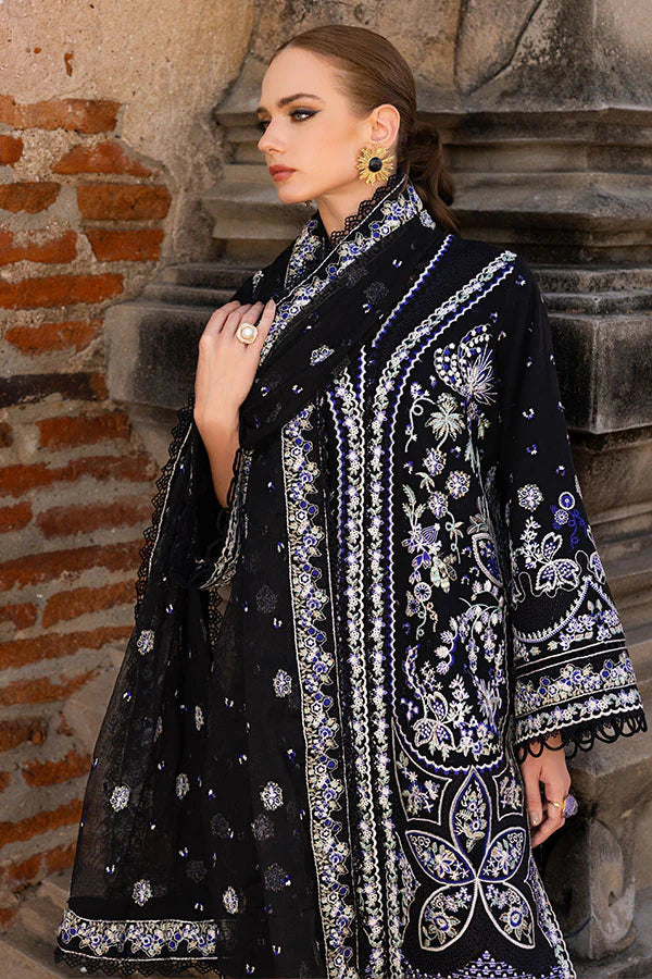 Model wearing black embroidered dress from Saffron Winter Edit Belle collection, Pakistani Luxury pret available online in UK.