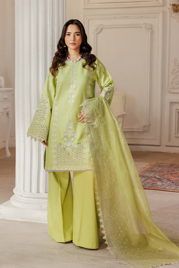 Model wearing Pear Drift by Saffron in pastel green with intricate embroidery – elegant Pakistani luxury pret outfit available online in UK.