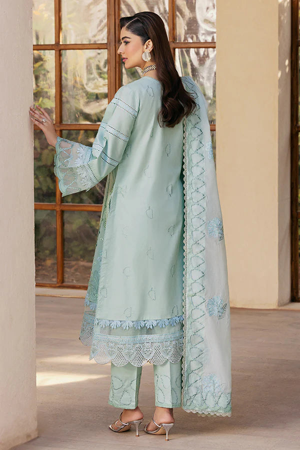 Model wearing pastel mint embroidered dress from Saffron Summer Soiree '25 Zoe, Pakistani luxury pret available online in UK.