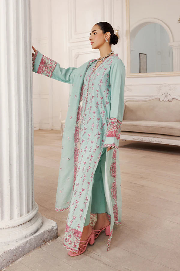 Model wearing Serenity by Saffron in pastel mint with pink embroidery – elegant Pakistani luxury pret outfit available online in UK.