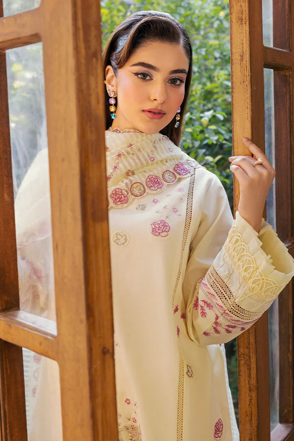 Model wearing cream and pink embroidered dress from Saffron Summer Soiree '25 Dove, Pakistani luxury pret available online in UK.