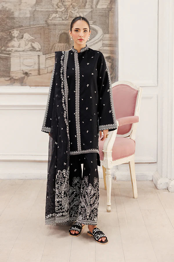 Model wearing Twilight Dreams by Saffron in black with silver embroidery – elegant Pakistani luxury pret outfit available online in UK.