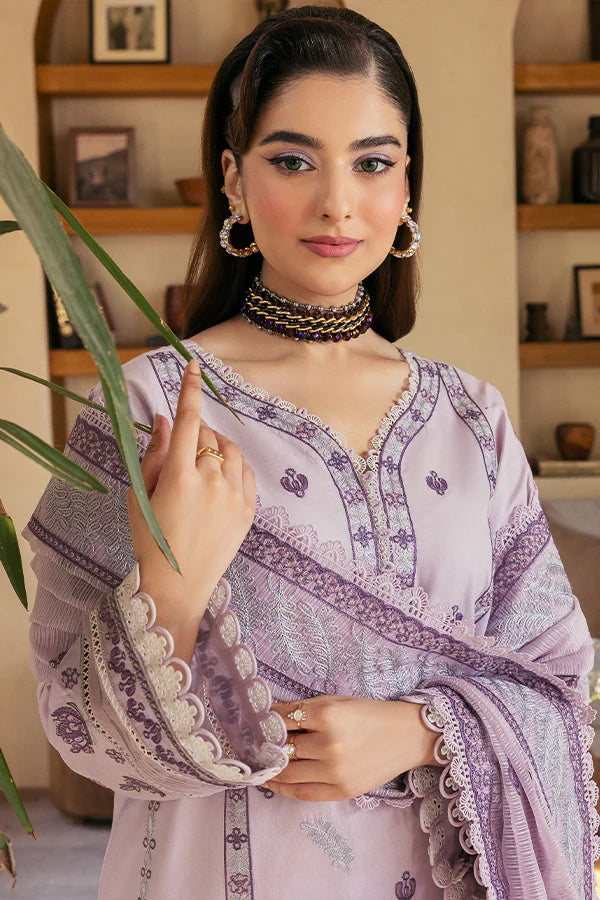 Model wearing lilac printed and embroidered dress from Saffron Summer Soiree '25 Celeste, Pakistani luxury pret available online in UK.