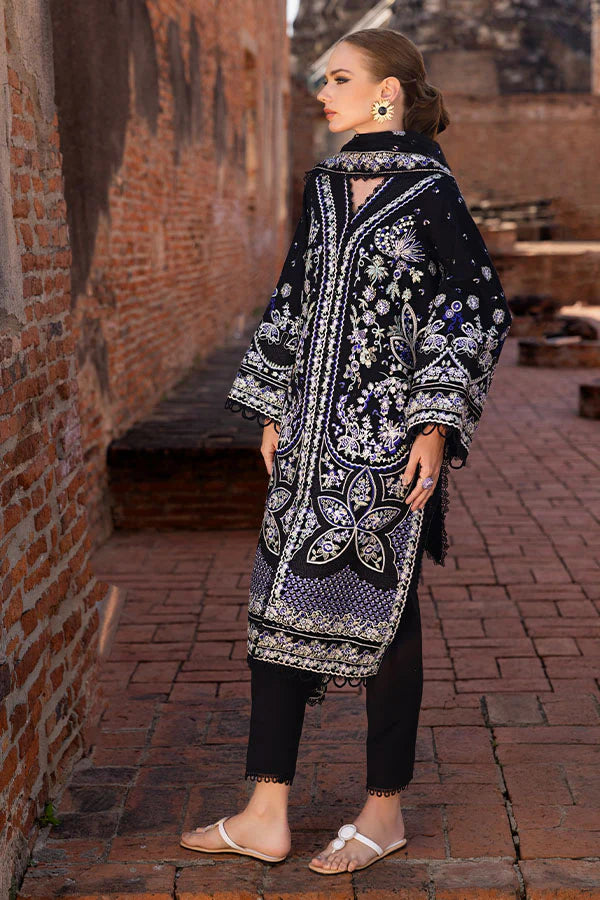 Model wearing black embroidered dress from Saffron Winter Edit Belle collection, Pakistani Luxury pret available online in UK.