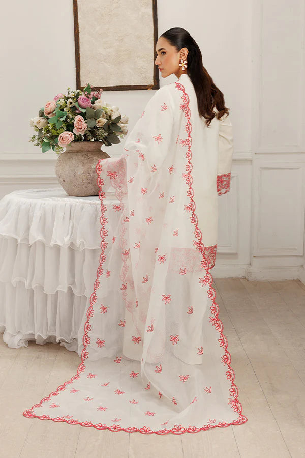 Model wearing Dewtide by Saffron in white with red floral embroidery – elegant Pakistani luxury pret outfit available online in UK.