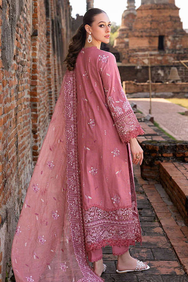 Model wearing rose pink embroidered dress from Saffron Winter Edit Froza, Pakistani luxury pret available online in UK.