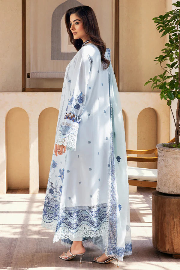 Model wearing powder blue printed and embroidered dress from Saffron Summer Soiree '25 Isla, Pakistani luxury pret available online in UK.