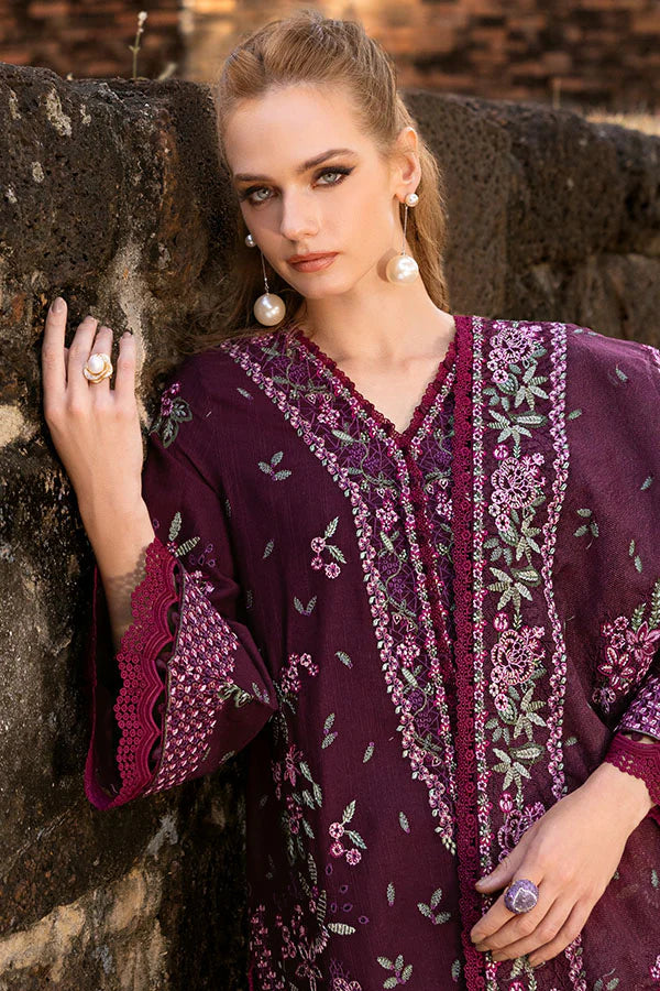 Model wearing plum embroidered dress from Saffron Winter Edit Diana, Pakistani luxury pret perfect for weddings, shop online in UK.