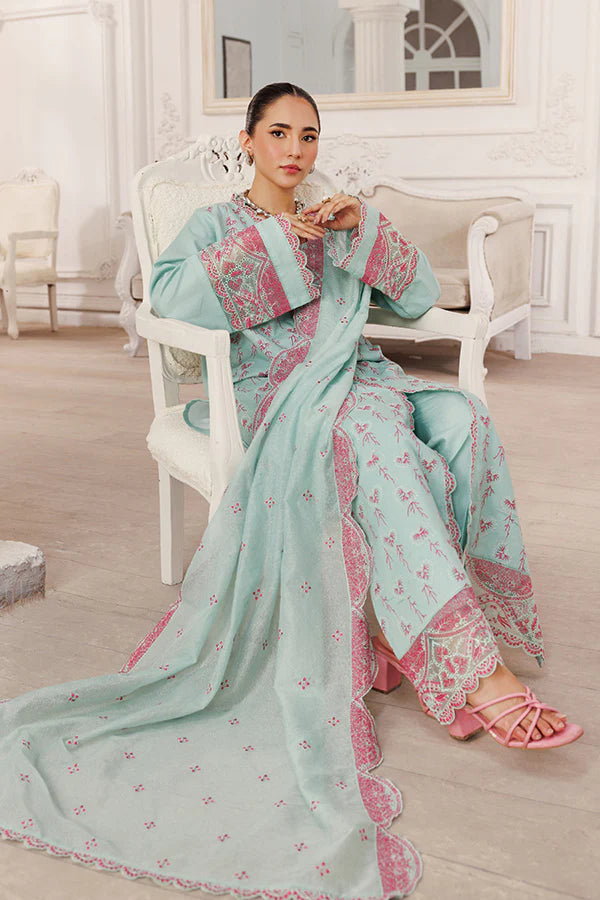 Model wearing Serenity by Saffron in pastel mint with pink embroidery – elegant Pakistani luxury pret outfit available online in UK.