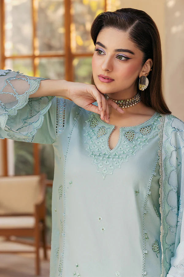 Model wearing pastel mint embroidered dress from Saffron Summer Soiree '25 Zoe, Pakistani luxury pret available online in UK.