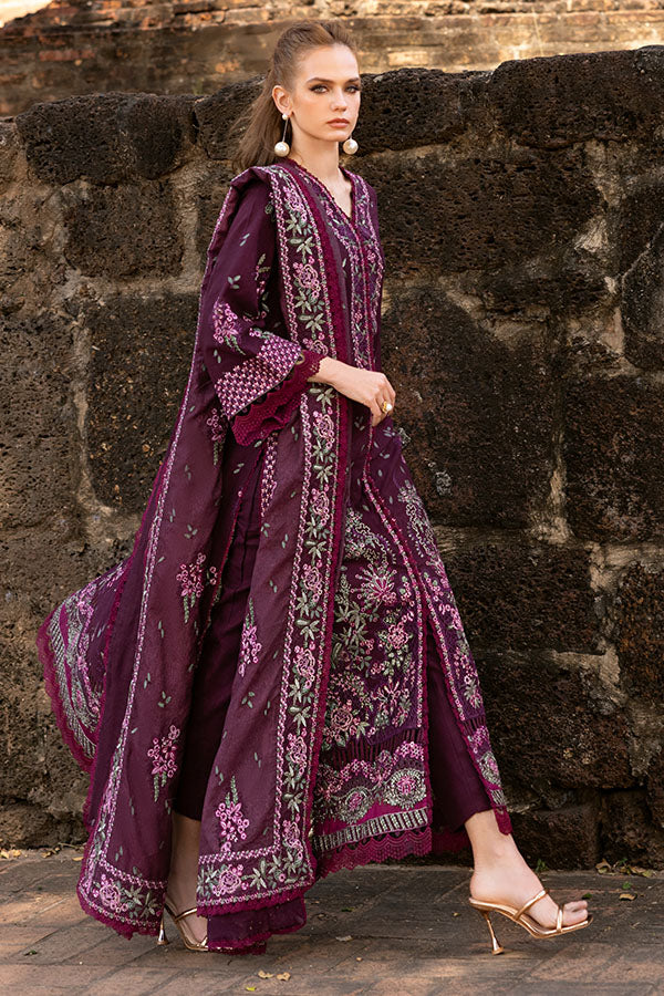 Model wearing plum embroidered dress from Saffron Winter Edit Diana, Pakistani luxury pret perfect for weddings, shop online in UK.