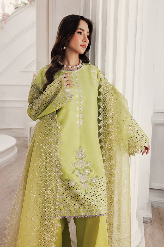 Model wearing Pear Drift by Saffron in pastel green with intricate embroidery – elegant Pakistani luxury pret outfit available online in UK.