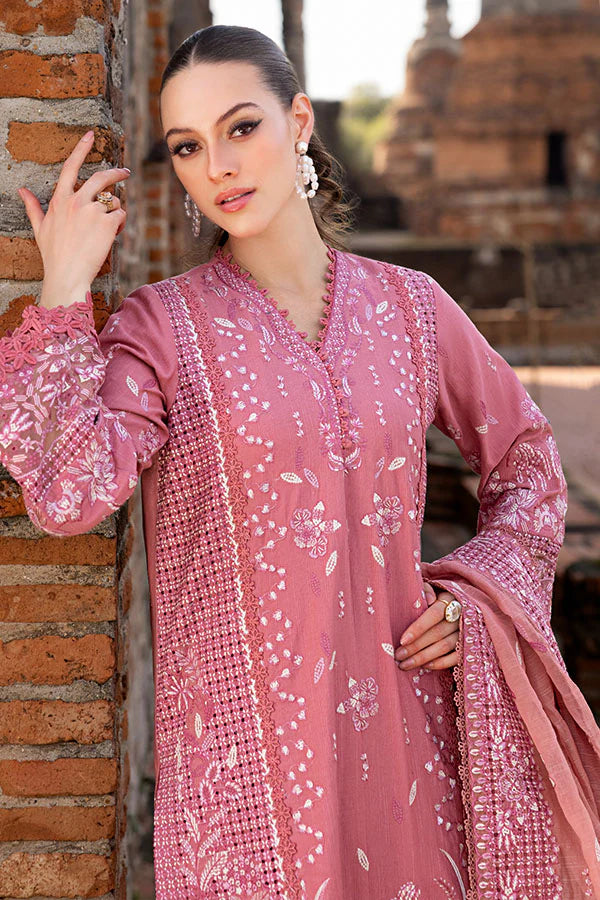 Model wearing rose pink embroidered dress from Saffron Winter Edit Froza, Pakistani luxury pret available online in UK.