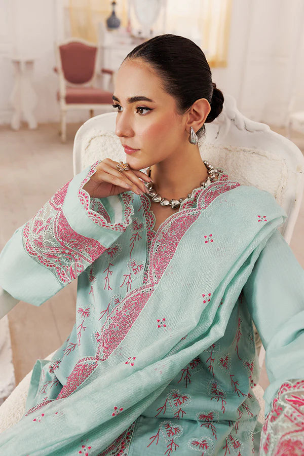Model wearing Serenity by Saffron in pastel mint with pink embroidery – elegant Pakistani luxury pret outfit available online in UK.