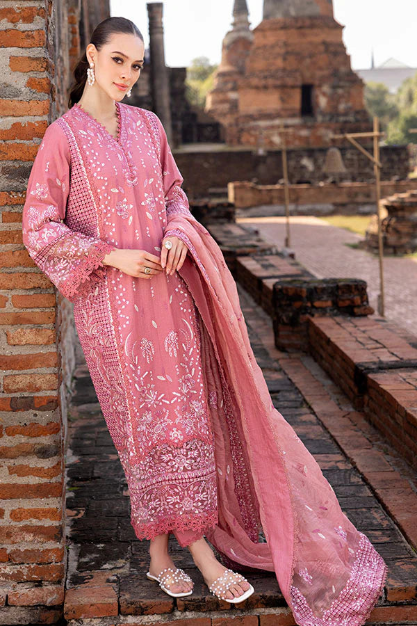 Model wearing rose pink embroidered dress from Saffron Winter Edit Froza, Pakistani luxury pret available online in UK.