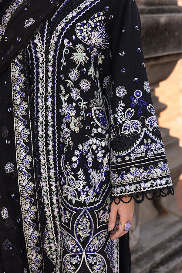 Model wearing black embroidered dress from Saffron Winter Edit Belle collection, Pakistani Luxury pret available online in UK.