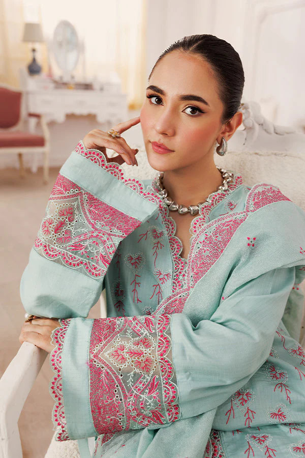 Model wearing Serenity by Saffron in pastel mint with pink embroidery – elegant Pakistani luxury pret outfit available online in UK.