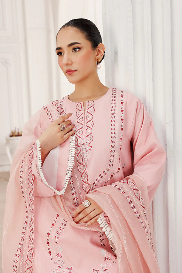 Model wearing Peach Blossom by Saffron in soft peach with delicate embroidery – stylish Pakistani luxury pret outfit available online in UK.