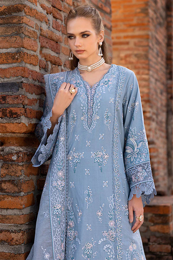 Model wearing powder blue embroidered dress from Saffron Winter Edit Aster, Pakistani luxury pret available online in UK.