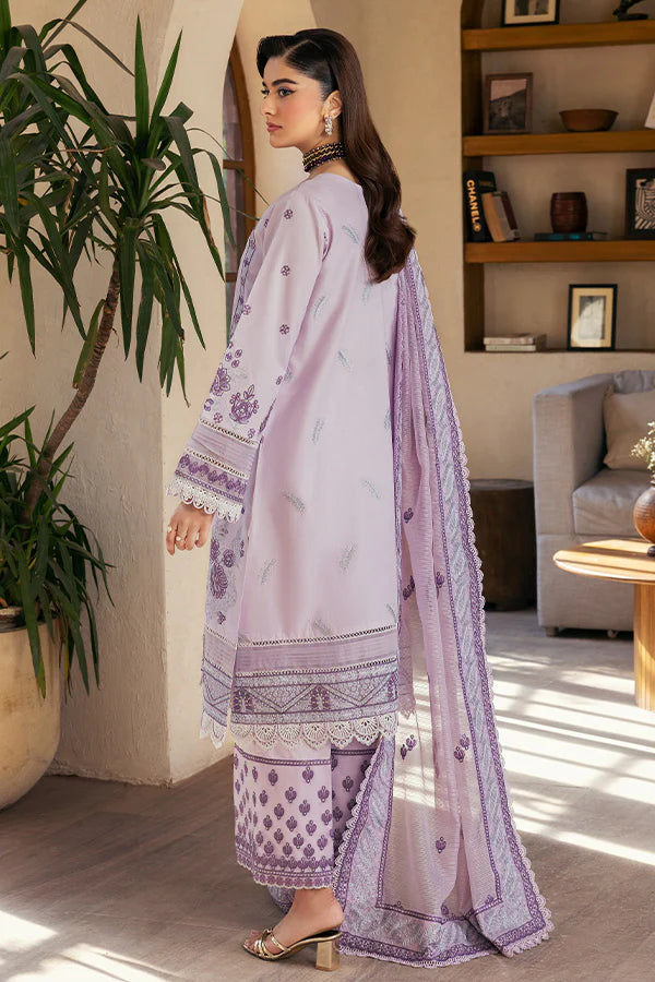 Model wearing lilac printed and embroidered dress from Saffron Summer Soiree '25 Celeste, Pakistani luxury pret available online in UK.