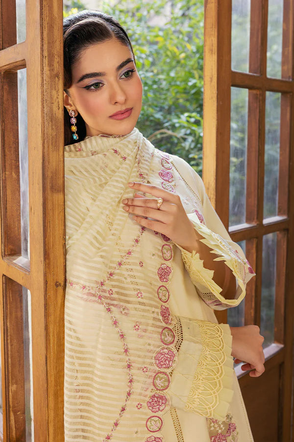 Model wearing cream and pink embroidered dress from Saffron Summer Soiree '25 Dove, Pakistani luxury pret available online in UK.