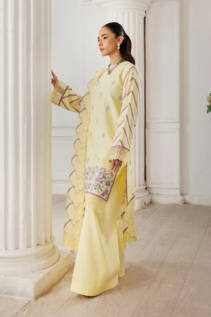 Model wearing Lemon Whisk by Saffron in soft yellow with floral embroidery – Pakistani luxury pret outfit online in UK.