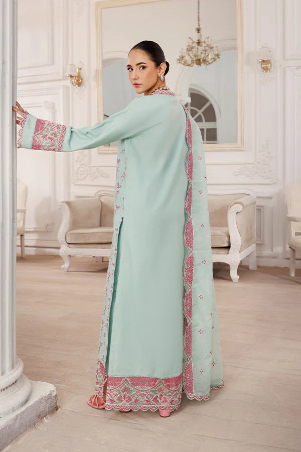 Model wearing Serenity by Saffron in pastel mint with pink embroidery – elegant Pakistani luxury pret outfit available online in UK.