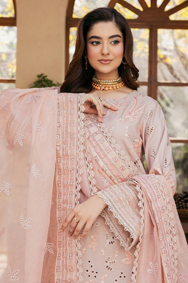 Model wearing soft peach embroidered dress from Saffron Summer Soiree '25 Fleur, Pakistani luxury pret available online in UK.