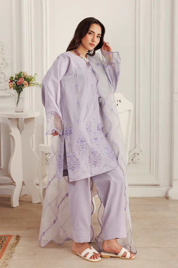 Model wearing Lilac Dust by Saffron in soft lavender with intricate detailing – Pakistani luxury pret outfit online in UK.