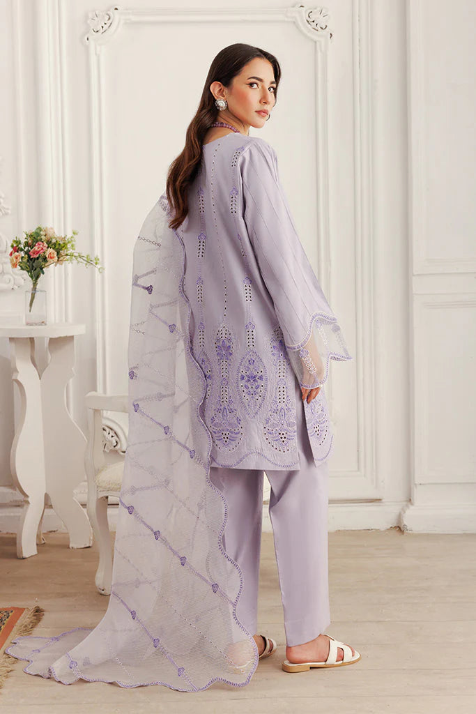 Model wearing Lilac Dust by Saffron in soft lavender with intricate detailing – Pakistani luxury pret outfit online in UK.