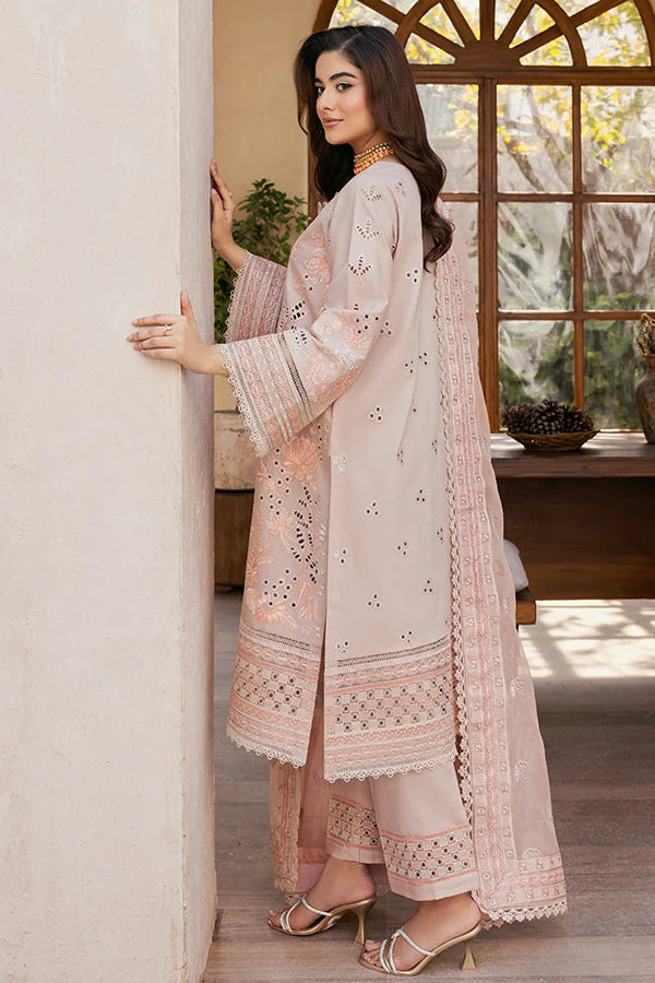 Model wearing soft peach embroidered dress from Saffron Summer Soiree '25 Fleur, Pakistani luxury pret available online in UK.