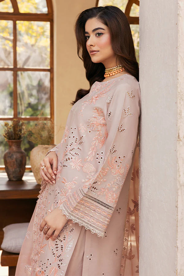 Model wearing soft peach embroidered dress from Saffron Summer Soiree '25 Fleur, Pakistani luxury pret available online in UK.