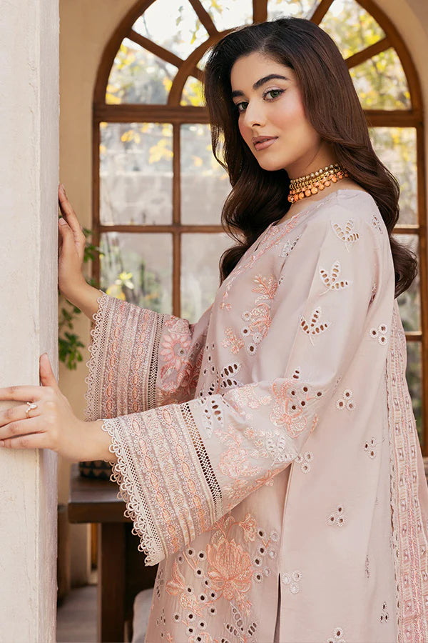Model wearing soft peach embroidered dress from Saffron Summer Soiree '25 Fleur, Pakistani luxury pret available online in UK.
