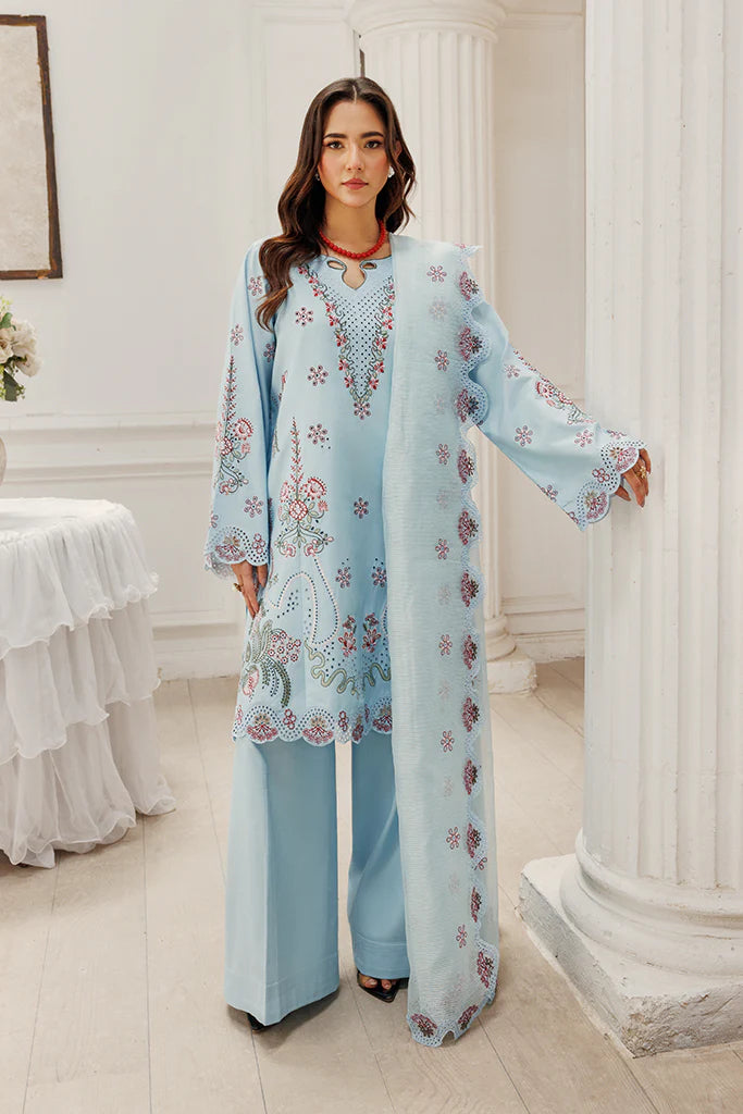 Model wearing Blush Skies by Saffron in pastel blue with delicate embroidery – premium Pakistani luxury pret outfit online in UK.