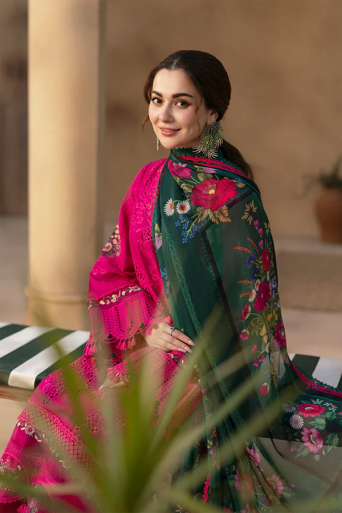 Model wearing hot pink embroidered three-piece suit with dark green printed dupatta from Saira Rizwan, Pakistani luxury pret, Pakistani clothes online in UK.