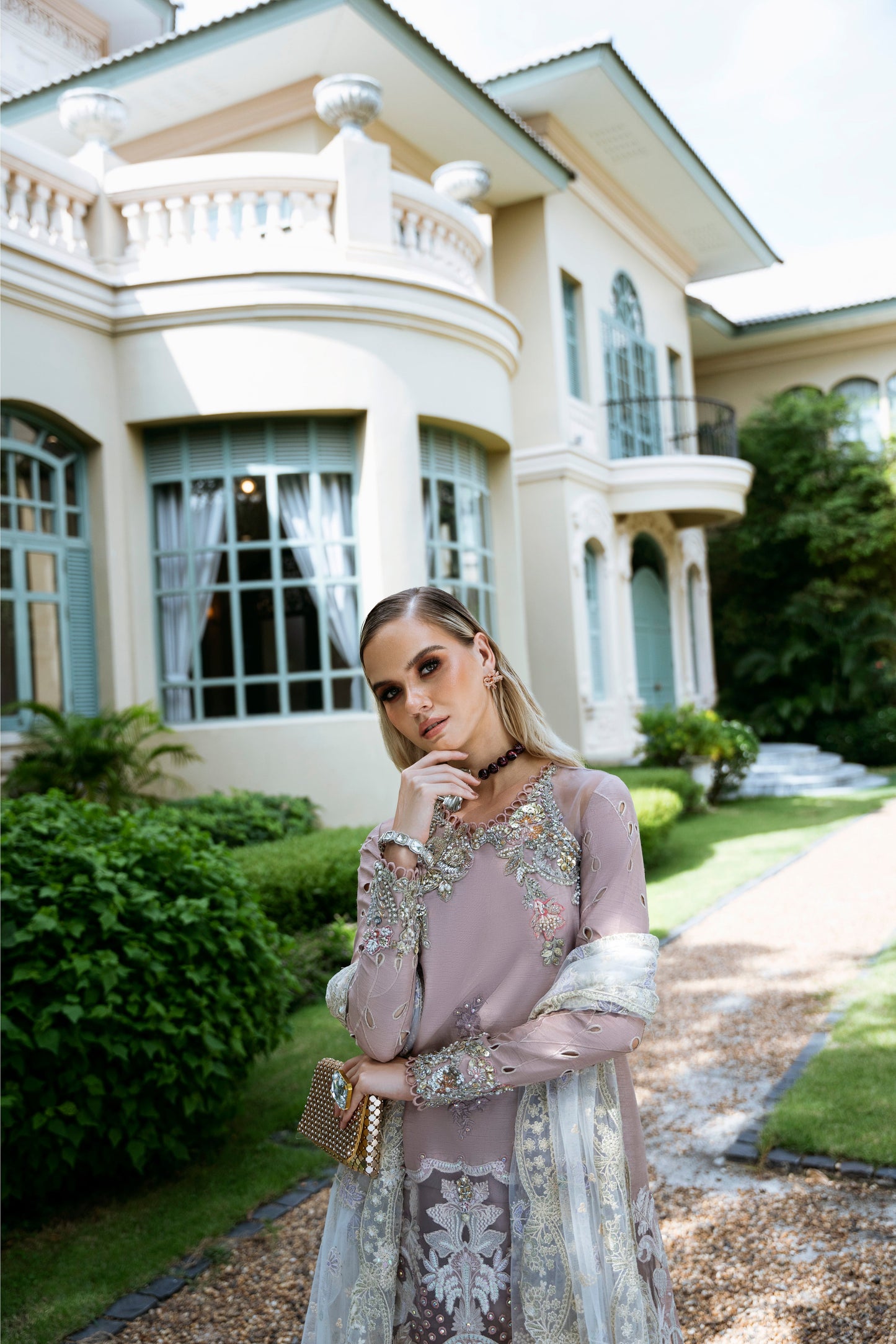 Model wearing Clara from Mysie by Tahira in beige luxury pret with intricate embroidery, perfect for Pakistani clothes online in UK.
