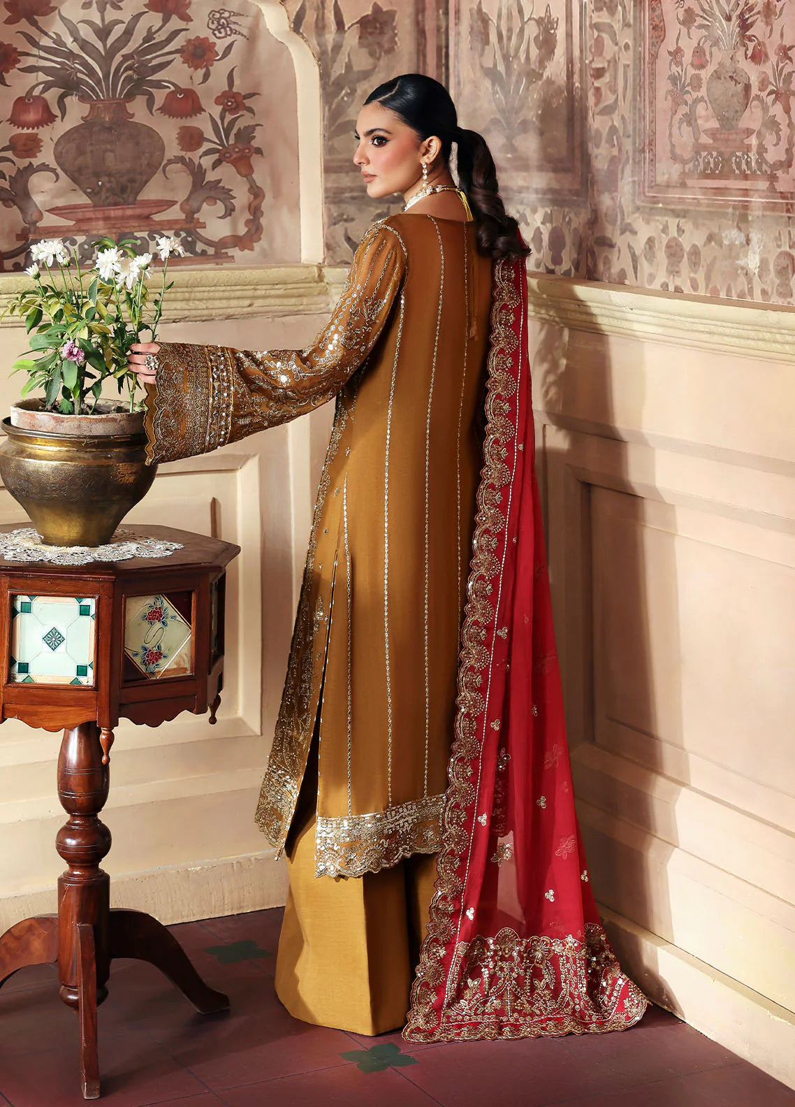 Model wearing Dinara by Gulaal in mustard and maroon with heavy chiffon embroidery – Pakistani luxury pret outfit online in UK.