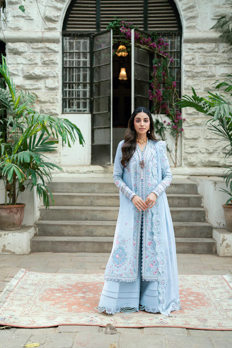 Model wearing pastel blue Qalamkar SB-04 Zarish embroidered outfit, ideal for Eid celebrations and Pakistani luxury pret online in UK.