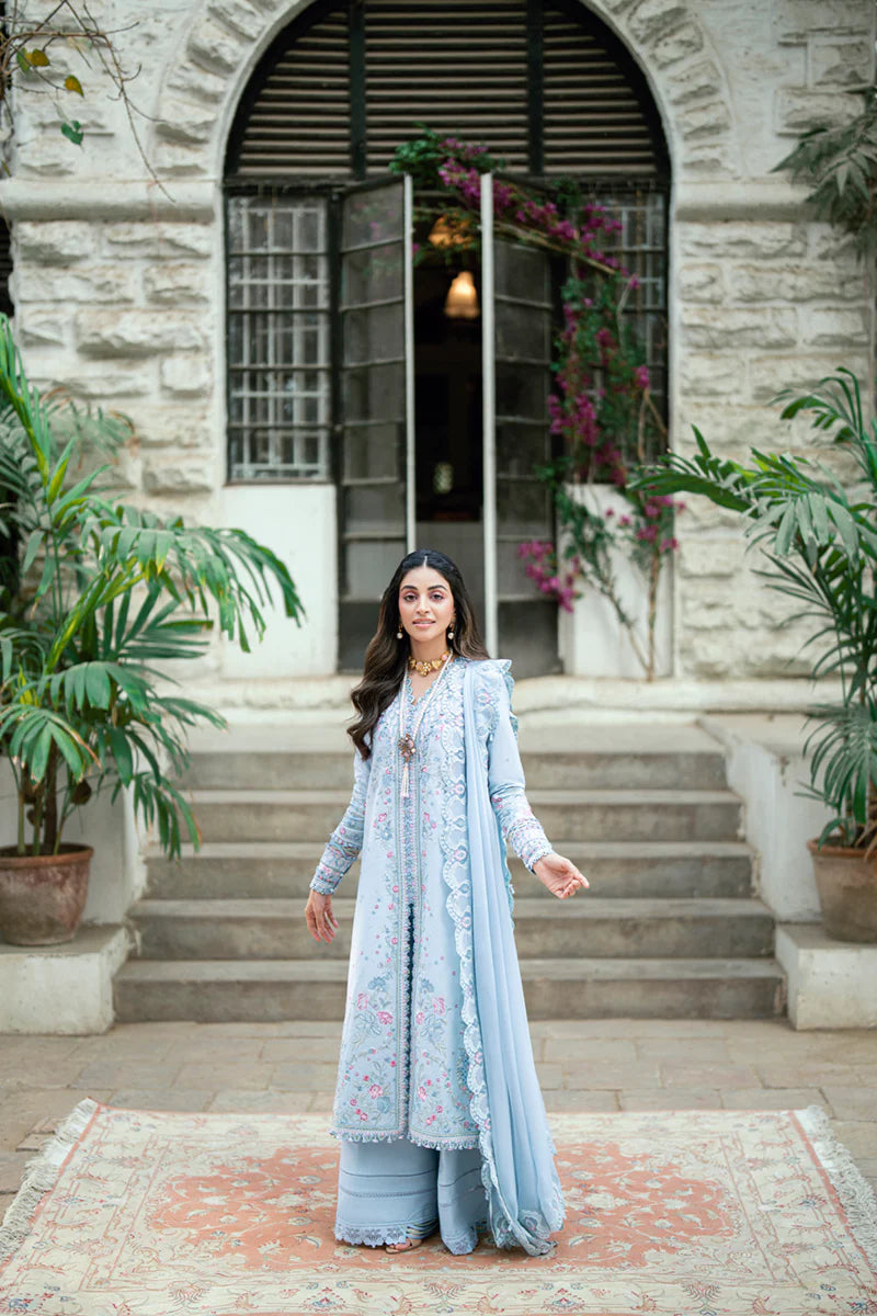 Model wearing pastel blue Qalamkar SB-04 Zarish embroidered outfit, ideal for Eid celebrations and Pakistani luxury pret online in UK.