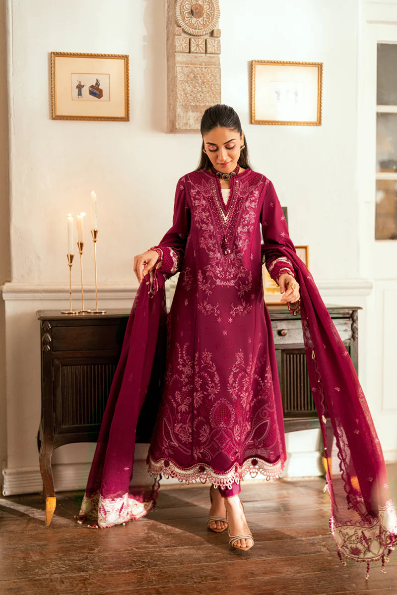 Model wearing maroon Qalamkar SB-02 Sameen embroidered outfit, ideal for Eid festivities and Pakistani luxury pret online in UK.
