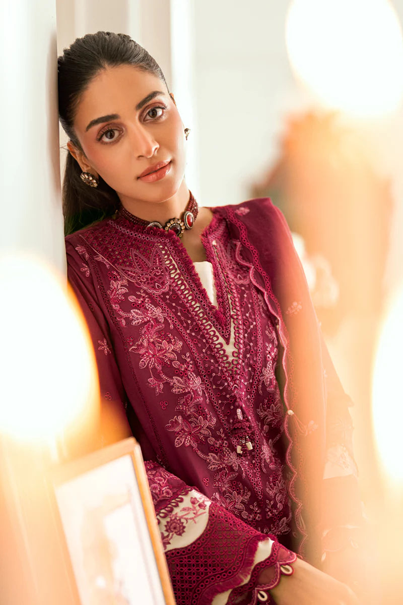 Model wearing maroon Qalamkar SB-02 Sameen embroidered outfit, ideal for Eid festivities and Pakistani luxury pret online in UK.